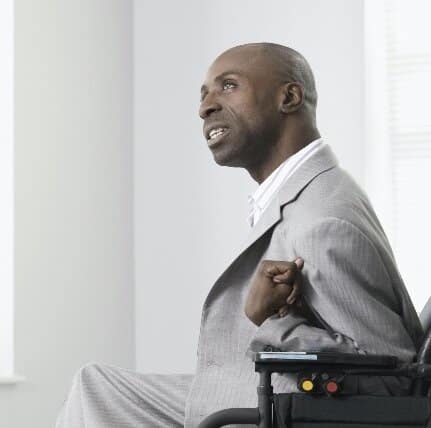 A lady sitting in a wheelchair thinking about what is cerebral palsy mental health